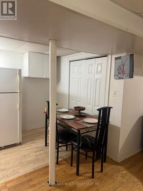 Brampton (Fletcher's Creek Village) house for rent - A dining room with a table set for two.
