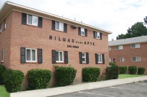 Newport News apartment for rent - a brick building with the name apartments on it