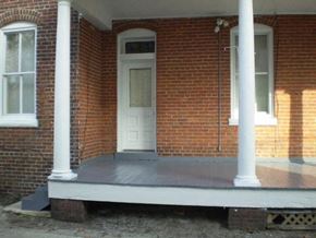 Newport News townhouse for rent - A porch with a white door and two white columns.