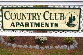 Morehead City apartment for rent - a sign for the county club apartments