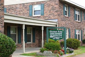Newport News apartment for rent - a building with a sign in front of it