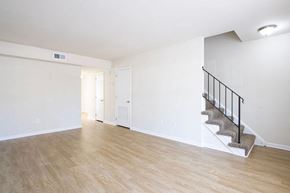 Newport News townhouse for rent - A room with a staircase and a door.