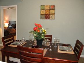 Brunswick apartment for rent - a dining room table with a vase of flowers