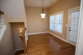 Kennesaw apartment for rent - a living room with a hard wood floor and a large window