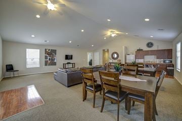 Erie apartment for rent - a living room and dining room with a table and chairs