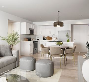 Brandon apartment for rent - A modern kitchen with a dining table set for four.