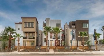 Tempe apartment for rent - A modern residential building with the name "ENNITIS" on the front.