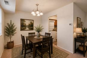 Parkville townhouse for rent - A dining room with a table and chairs.