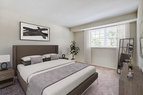 Parkville townhouse for rent - Staged bedroom with large window