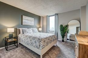 Newport News apartment for rent - a bedroom with a bed and a window