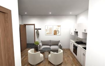 Appleton apartment for rent - A modern living room with a grey couch and a wooden door.