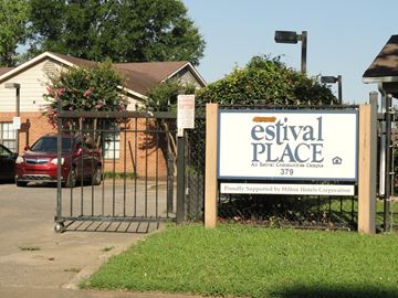 Memphis apartment for rent - A sign for the Estival Place Assisted Living Campus is displayed in front of a gated entrance.
