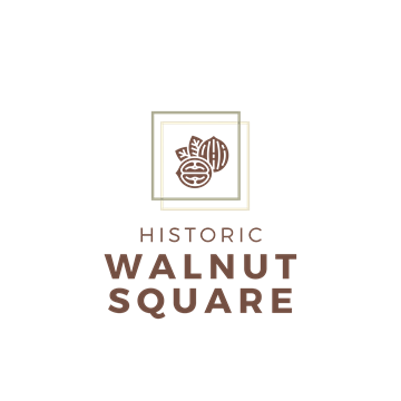 Terre Haute apartment for rent - A logo with a walnut and the words "Historic Walnut Square" on a black background.