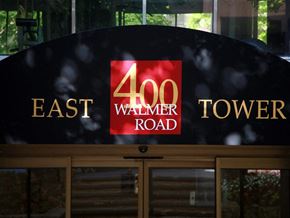 Toronto apartment for rent - A sign for the 400 Walmer Road Tower is displayed on a building.