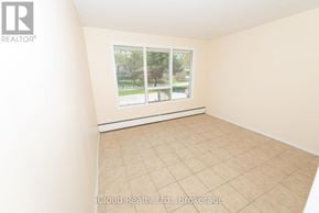 Waterloo duplex for rent - A room with a window and a door.
