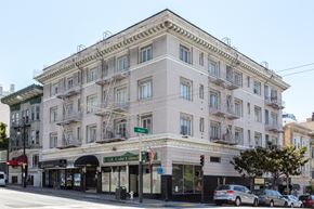 San Francisco apartment for rent - a large white building on the corner of a city street