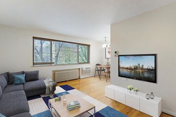 Denver apartment for rent - a living room with a couch and a tv