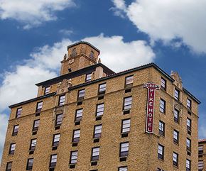 Little Rock apartment for rent - a tall brick building with a clock tower on top of it