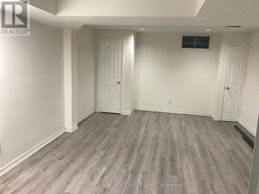 Toronto (Bridle Path-Sunnybrook-York Mills) house for rent - A room with grey flooring and white walls.