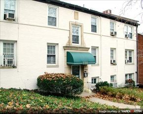 Washington apartment for rent - A white building with a green awning and a sign that reads 2320.
