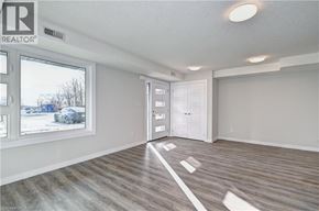 Kitchener townhouse for rent - A room with a REALTOR® logo on the wall.