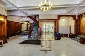 San Francisco apartment for rent - A large, elegant room with a staircase and a chandelier.