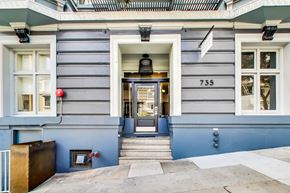 San Francisco apartment for rent - A grey building with the number 735 on it.