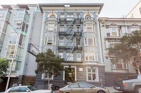 San Francisco apartment for rent - A building with a fire escape on the side.