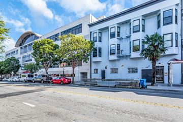 San Francisco apartment for rent - A red car is parked on the side of the street.