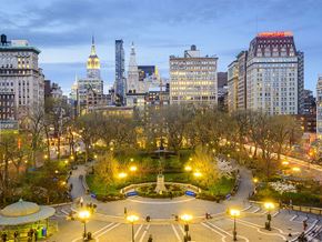 New York apartment for rent - a view of a park and the city skyline at night