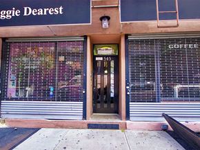 New York apartment for rent - the front of a coffee shop with closed doors