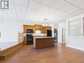 For rent in Kincardine - A room with a white door and a brown counter.