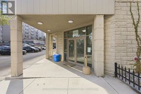 Hamilton (Durand) multi-family for rent - The image shows the front of a building with a blue trash bin in front of it.