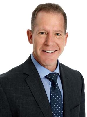 DREW WOOLCOTT, RE/MAX ESCARPMENT REALTY INC.