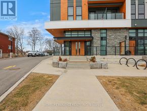 Waterloo condo for rent - A bathroom with a white sink and a bathtub.