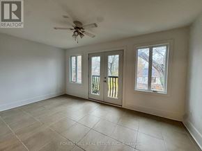 Toronto (Annex) house for rent - A room with a ceiling fan and tiled flooring.
