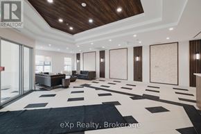 Hanover condo for rent - A spacious room with a black and white checkered floor and wooden ceiling.