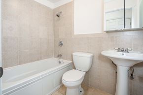 Jersey City apartment for rent - a bathroom with a sink toilet and a bath tub