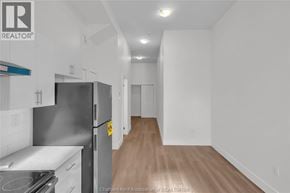 Dresden apartment for rent - A kitchen with a refrigerator, stove, and sink.