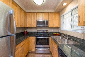 Chino Hills apartment for rent - a kitchen with a stove sink and refrigerator