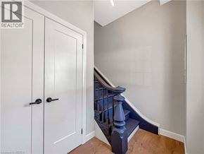 Woodstock house for rent - A white door with a black handle is on the left side of the image.
