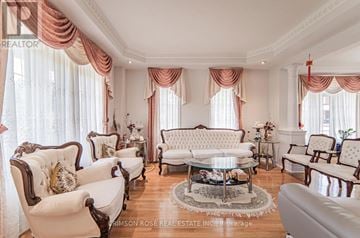 Burlington (Orchard) house for rent - A living room with white furniture and pink drapery.