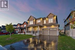 Ottawa house for rent - A house with a front porch and a garage door.