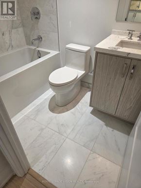 Toronto (Englemount-Lawrence) condo for rent - A large indoor swimming pool in a luxurious room.