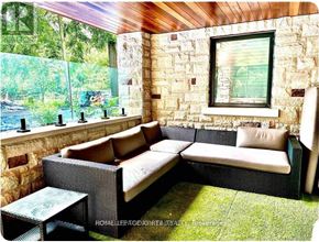 Toronto (Guildwood) house for rent - A patio with a couch and a table.