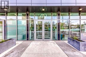 Hamilton (Corktown) multi-family for rent - The entrance to a building with glass doors and windows.