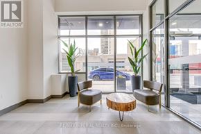 Hamilton (Corktown) multi-family for rent - A brokerage office with a large window and a view of the street.