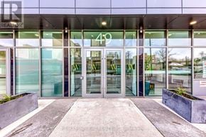 Hamilton (Corktown) multi-family for rent - The entrance to a building with glass doors and windows.