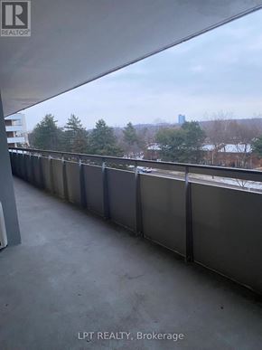 Markham (Royal Orchard) condo for rent - A balcony with a view of a city skyline.