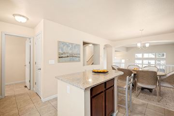 Castle Rock apartment for rent - A kitchen with a counter and chairs.